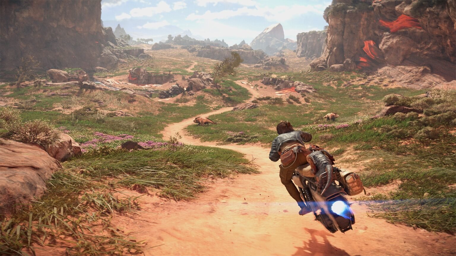 The protagonist of Star Wars outlaws speeding on a bike